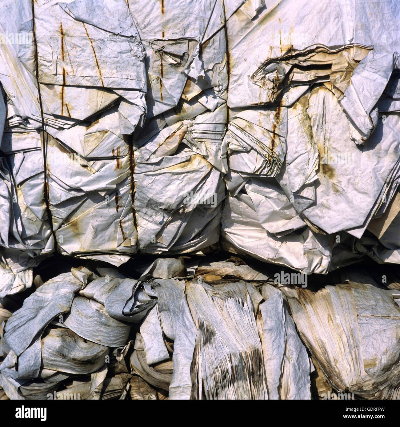Compressed pile of paper products, recycling Stock Photo - Alamy