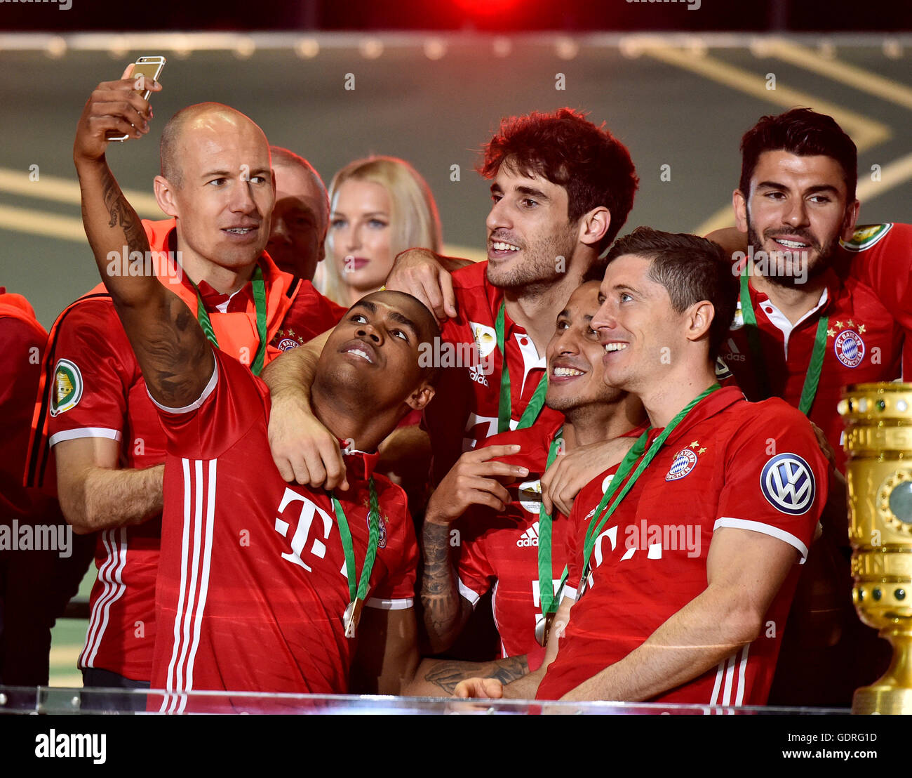 Soccer players of Bayern Munich, cheering after winning the DFB Cup, Selfie of Douglas Costa, Robert Lewandowski Stock Photo