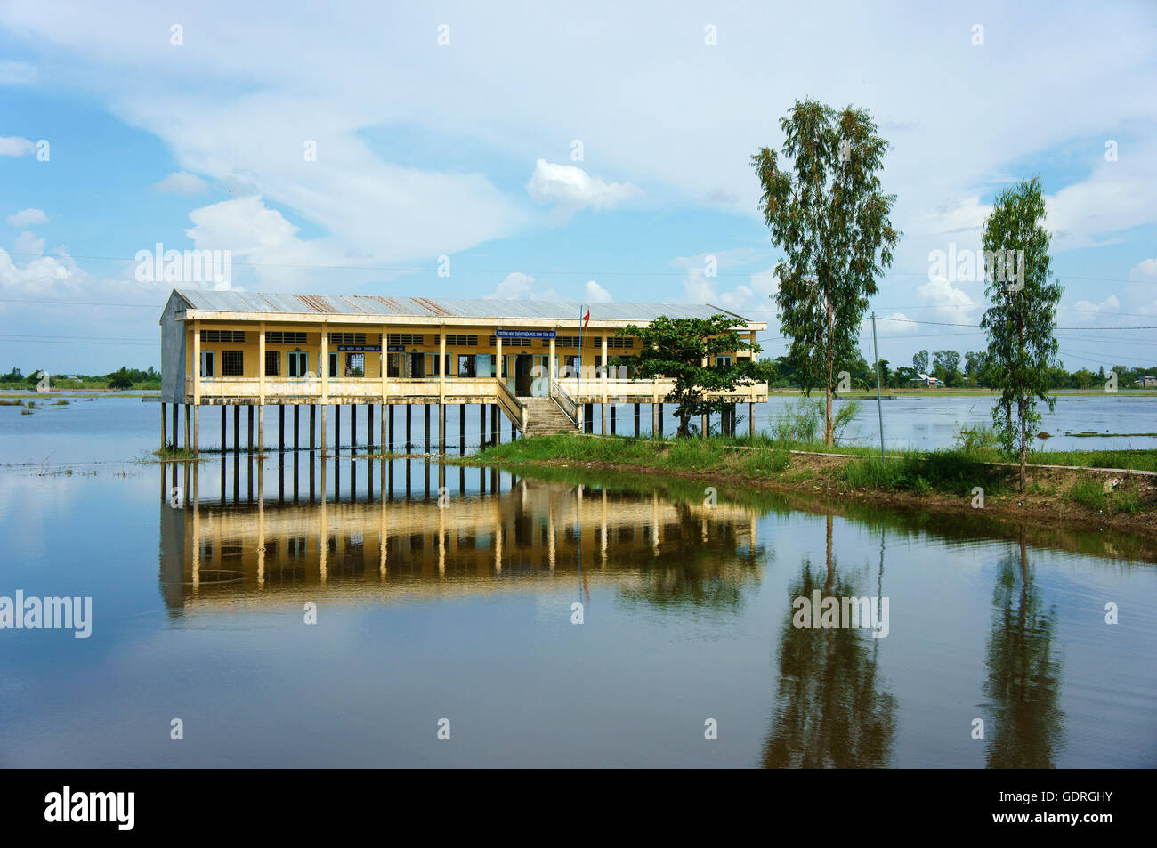 Vietnamese shool in flooded season Stock Photo