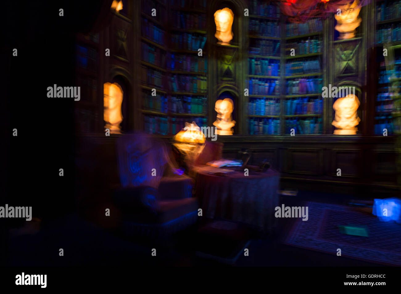 Colorful blurred image symbolizing dreams, nightmares and ghostly apparitions. View on an imaginary library with book shelves Stock Photo