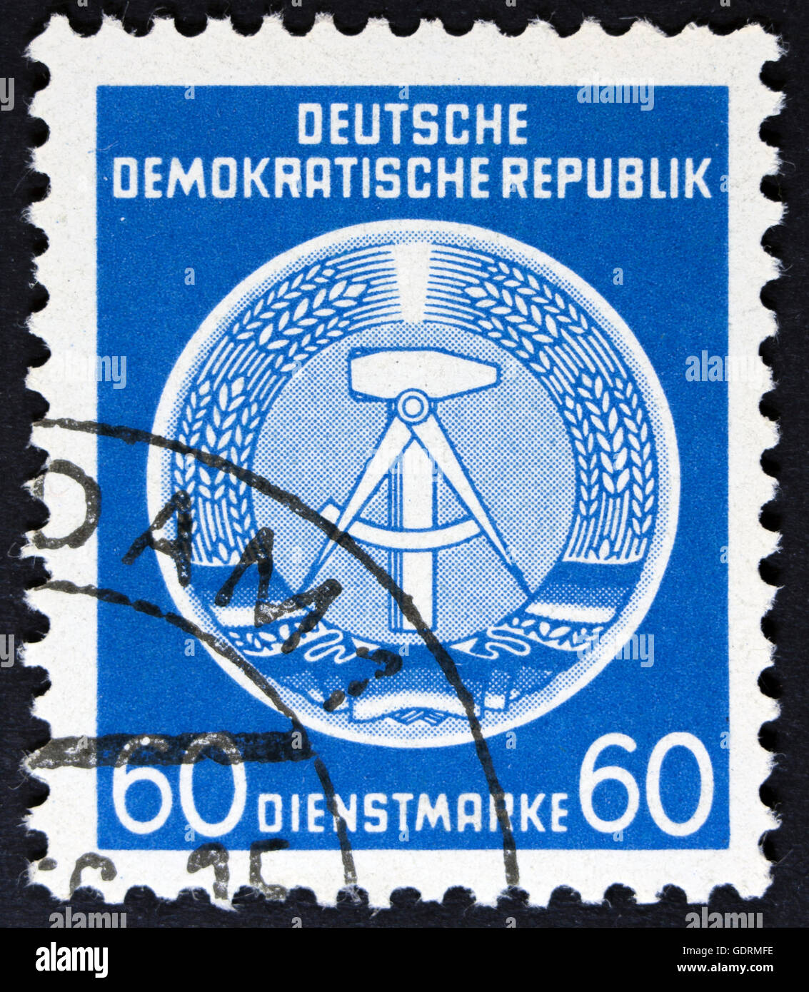 GDR - CIRCA 1952: A Stamp printed in GDR (German Democratic Republic - East Germany) shows DDR national coat of arms with inscri Stock Photo