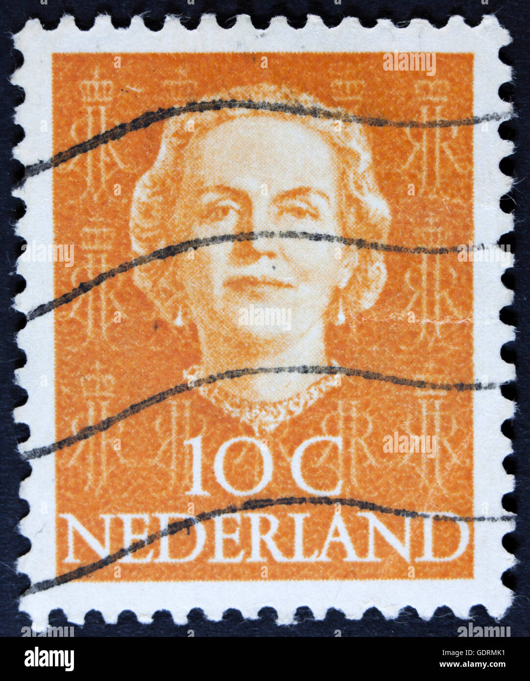NETHERLANDS - CIRCA 1949: A stamp printed in Netherlands, shows portrait of Queen Whilhelmina, monogram and a crown without insc Stock Photo