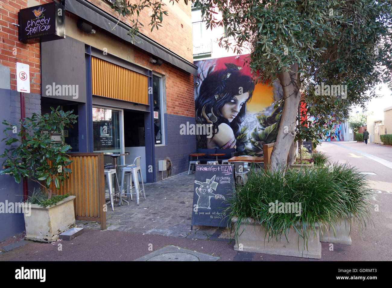 Cafe offering PokemonGo and pizza deals, Cheeky Sparrow, Wolf Lane, Perth CBD, Western Australia. No PR Stock Photo