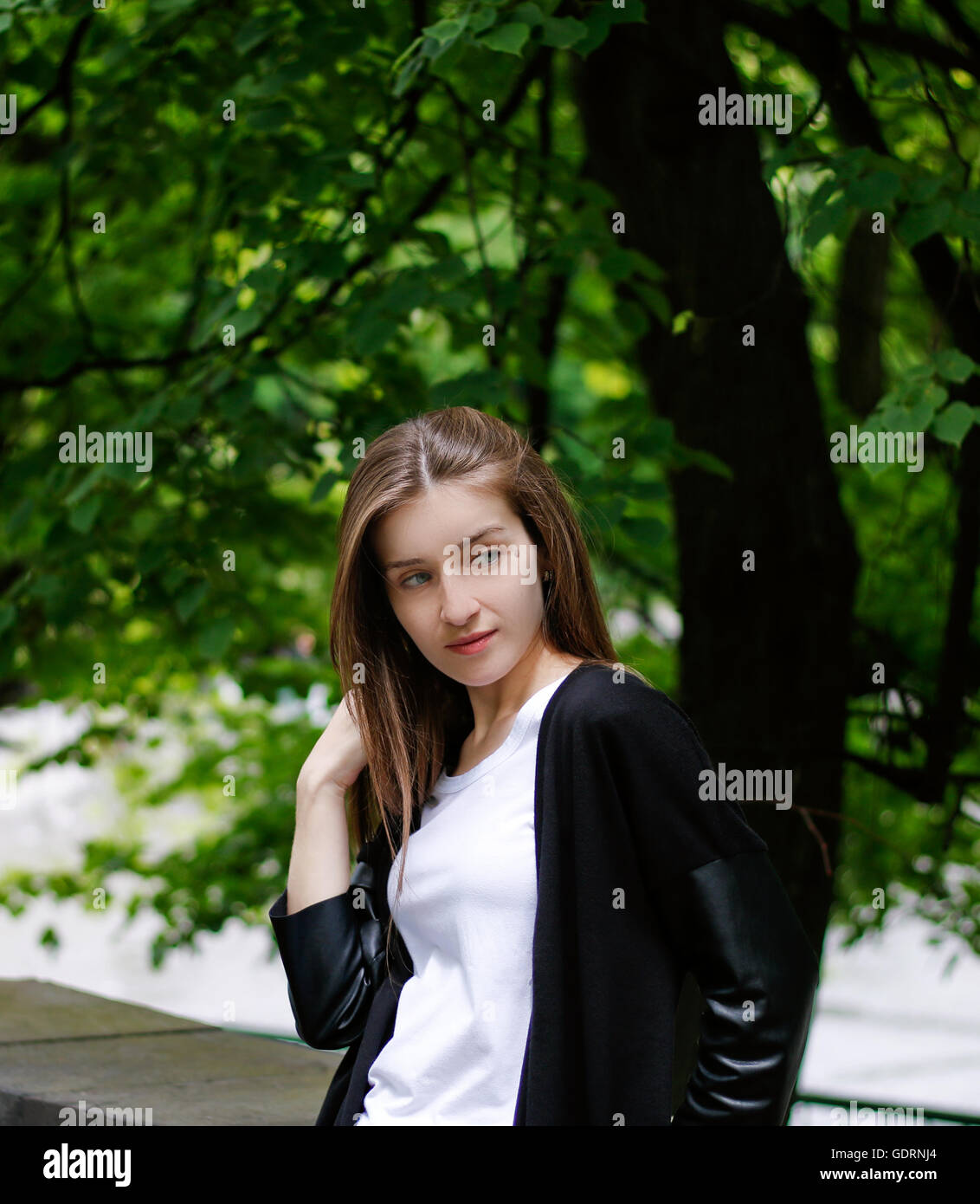 portrait of a pretty girl in the park Stock Photo - Alamy