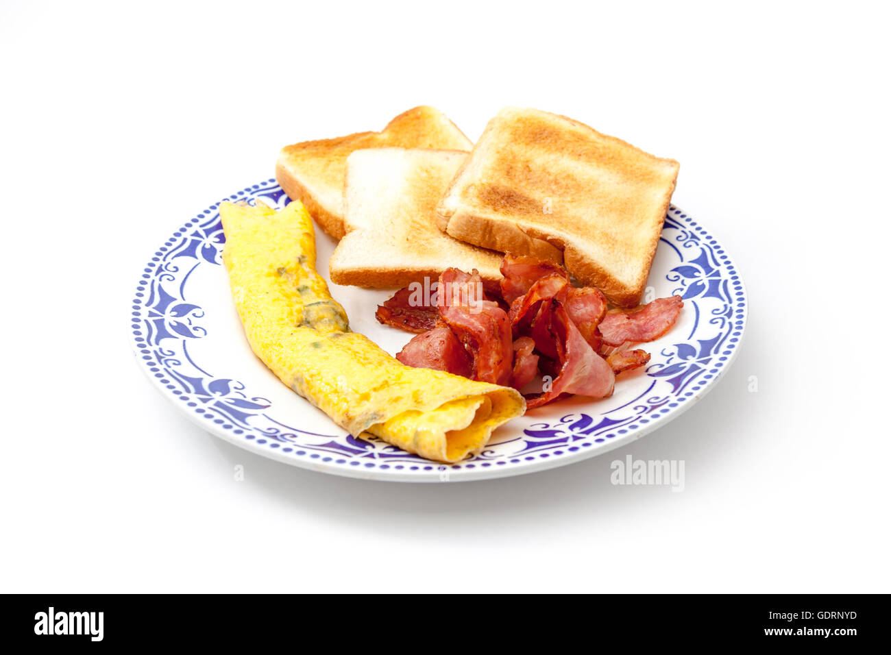 Breakfast on an plate of bacon and eggs and toast Stock Photo - Alamy