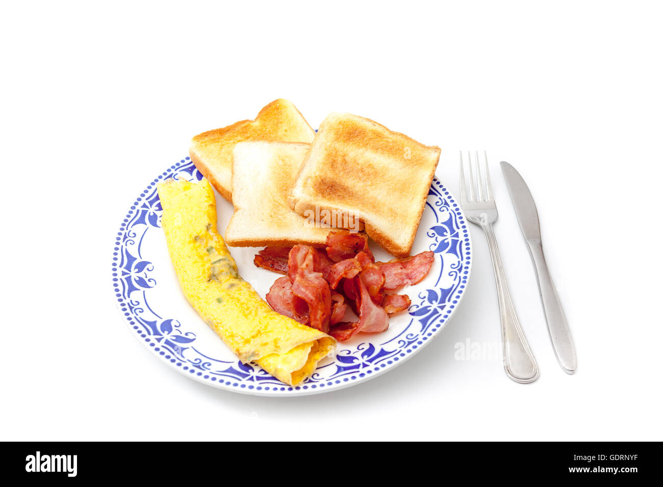 Breakfast on an plate of bacon and eggs and toast Stock Photo - Alamy