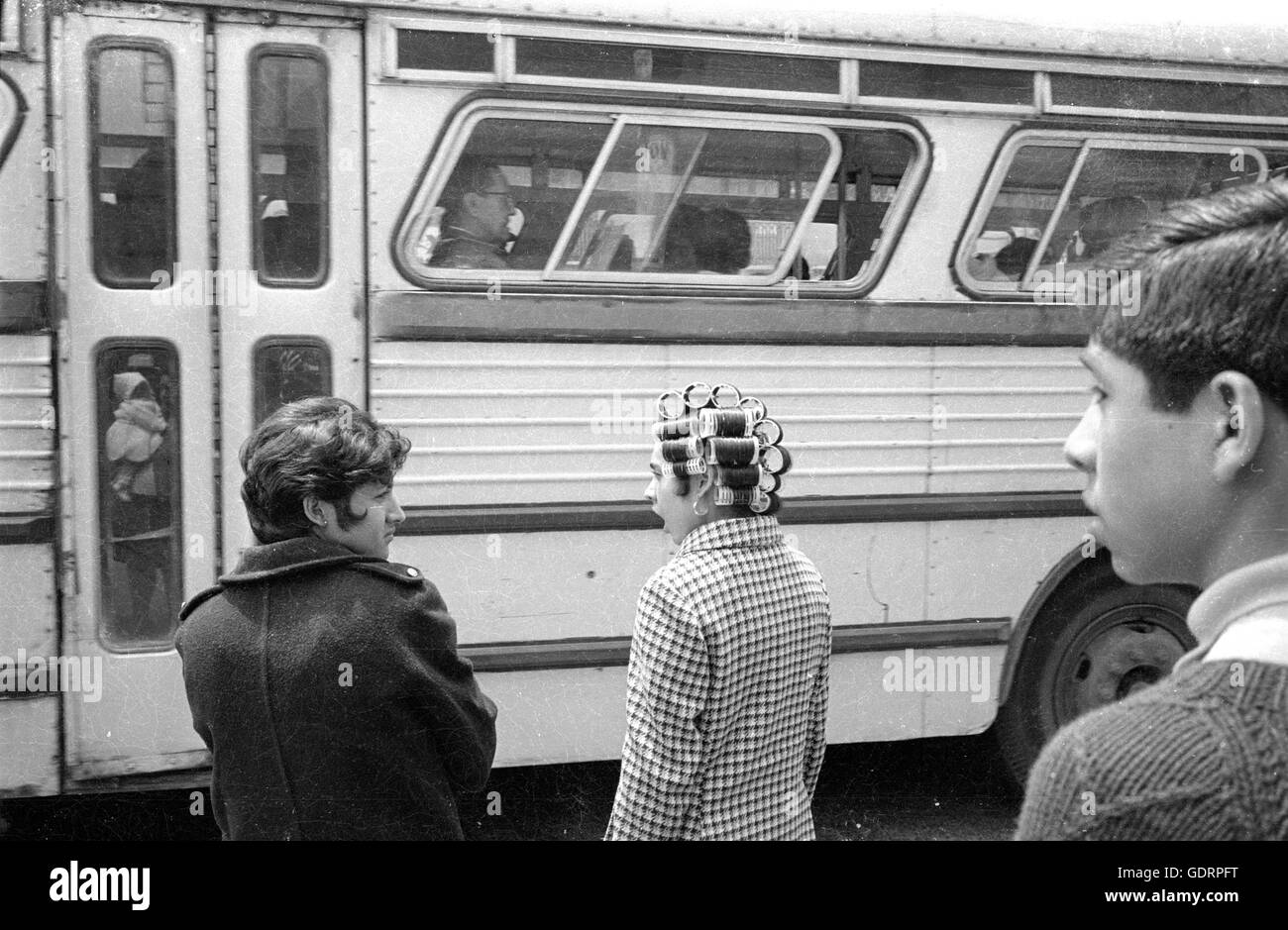 Passersby on a city bus in Mexico City, 1970 Stock Photo