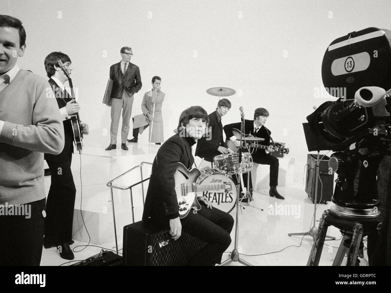 The Beatles on a set of a TV studio for A Hard Day's Night at La Scala Theatre in London Stock Photo