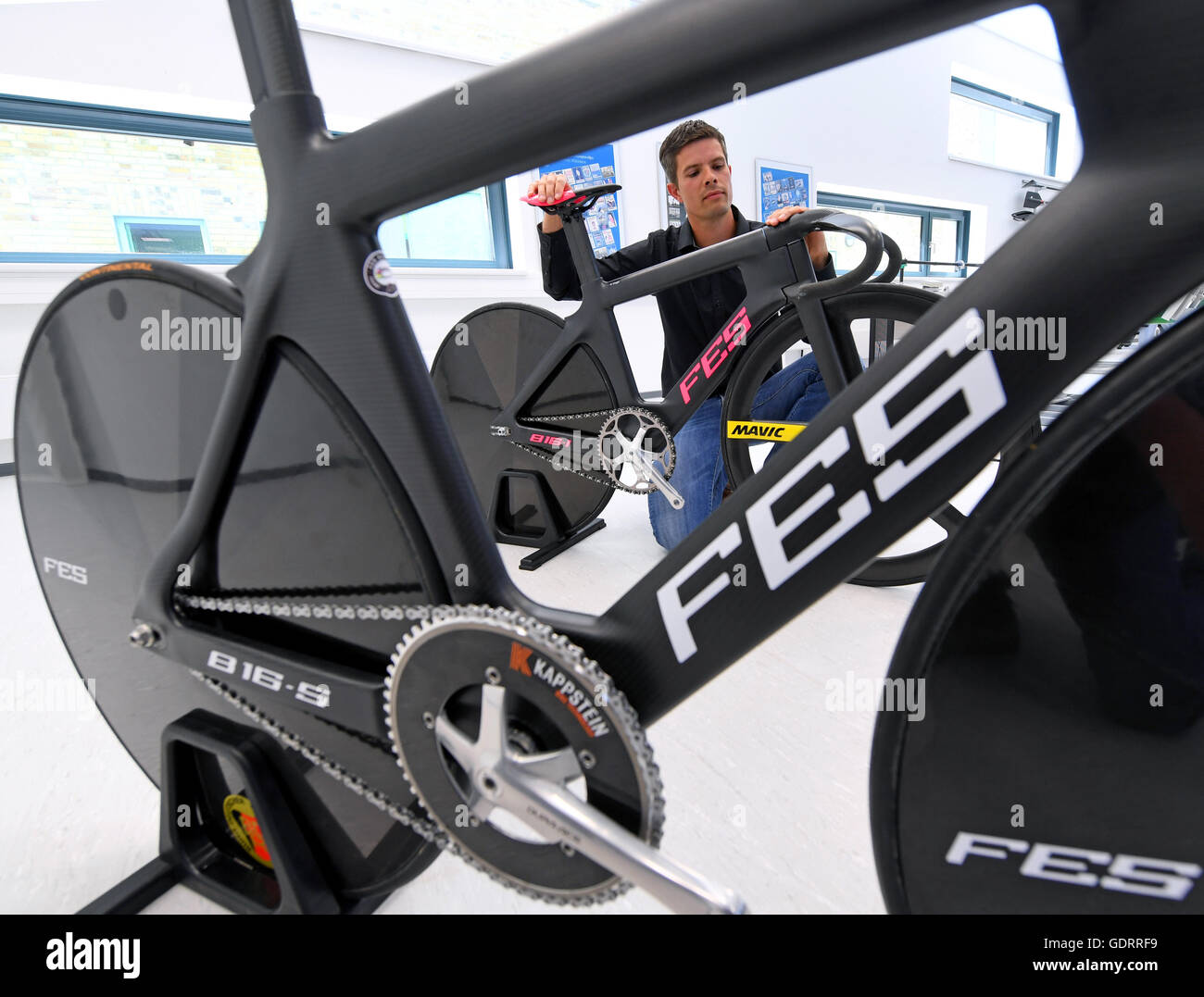 The project director ofr cycling at the Institute for the Research and Development of Sports Equipment FES Ronny Hartnick presents the brand new fixed wheel bicycles for the German Olympic track cycli...