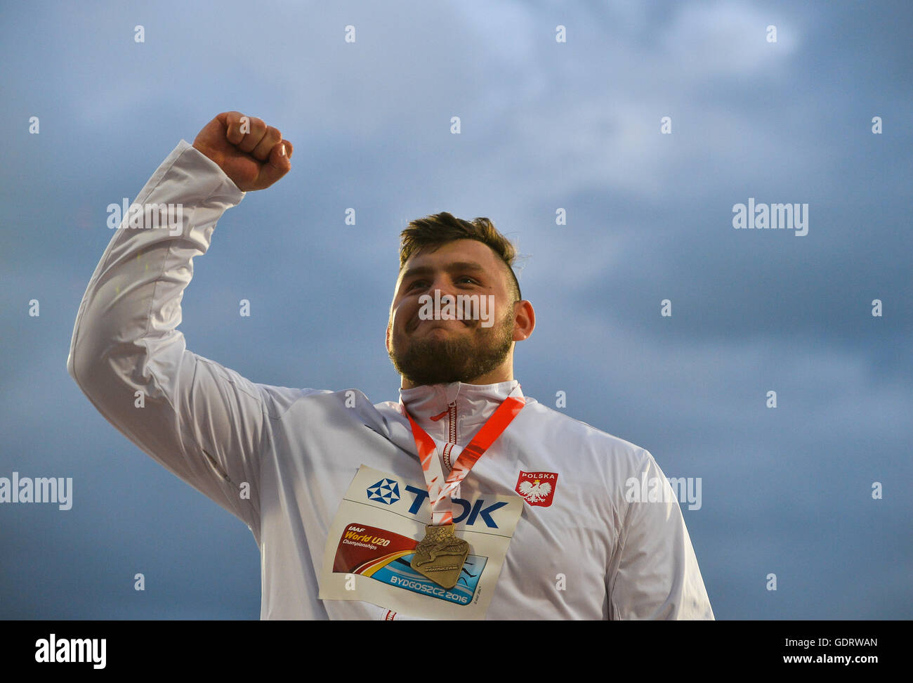 Bydgoszcz, Poland. 19th July, 2016. Konrad Bukowiecki of Poland with his gold medal during the afternoon session on day 1 of the IAAF World Junior Championships at Zawisza Stadium on July 19, 2016 in Bydgoszcz, Poland. Credit:  Roger Sedres/Alamy Live News Stock Photo
