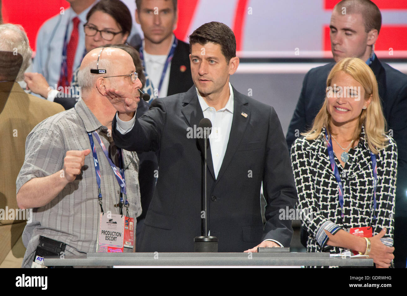 United States Speaker of the House Paul Ryan (Republican of Wisconsin) and his wife Janna participate in a rehearsal prior to the 2016 Republican National Convention in Cleveland, Ohio on Sunday, July 17, 2016. Standing behind them and pointing is US . Credit: Ron Sachs/CNP (RESTRICTION: NO New York or New Jersey Newspapers or newspapers within a 75 mile radius of New York City) - NO WIRE SERVICE - Stock Photo