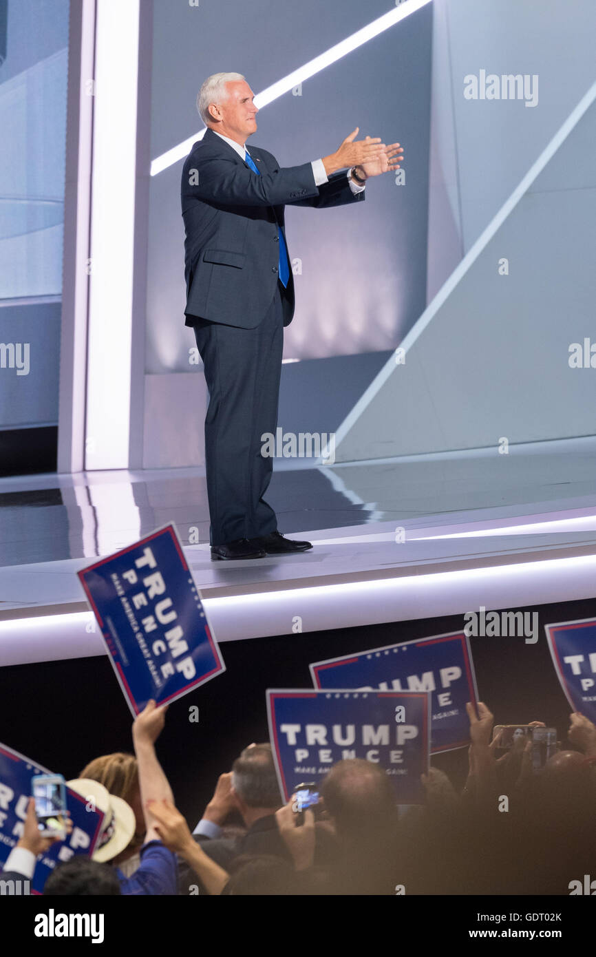 Cleveland, United States. 20th July, 2016. Gov. Mike Pence points toward his family sitting in the stands as he walks onstage to addresses delegates and accept the nomination as GOP Vice Presidential candidate during the third day of the Republican National Convention July 20, 2016 in Cleveland, Ohio. Credit:  Planetpix/Alamy Live News Stock Photo