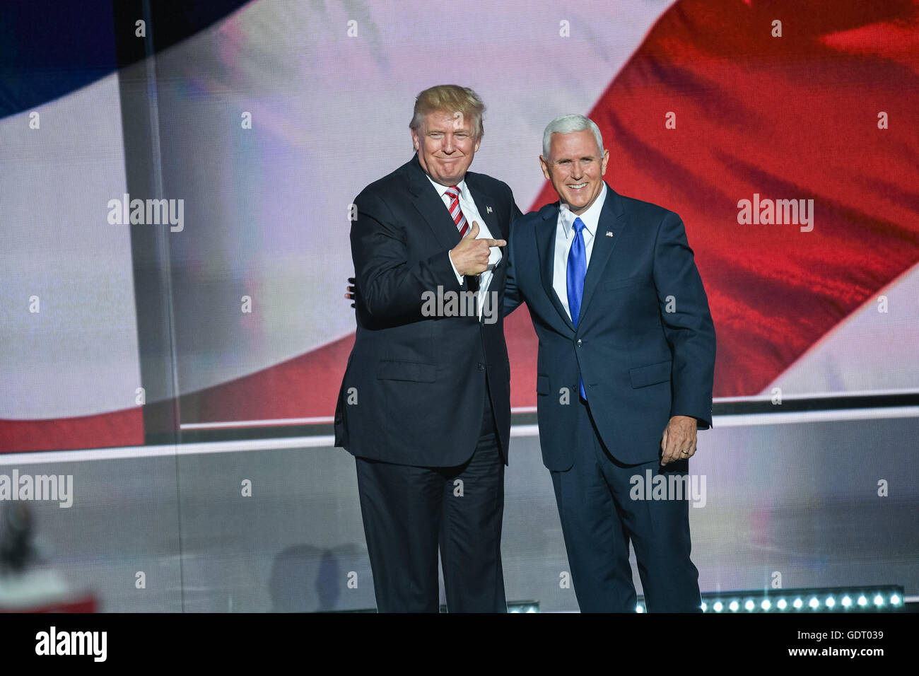 Cleveland, United States. 20th July, 2016. GOP Presidential nominee Donald Trump congratulates his running mate Gov. Mike Pence after Pence formally accepted the nomination during the third day of the Republican National Convention July 20, 2016 in Cleveland, Ohio. Credit:  Planetpix/Alamy Live News Stock Photo