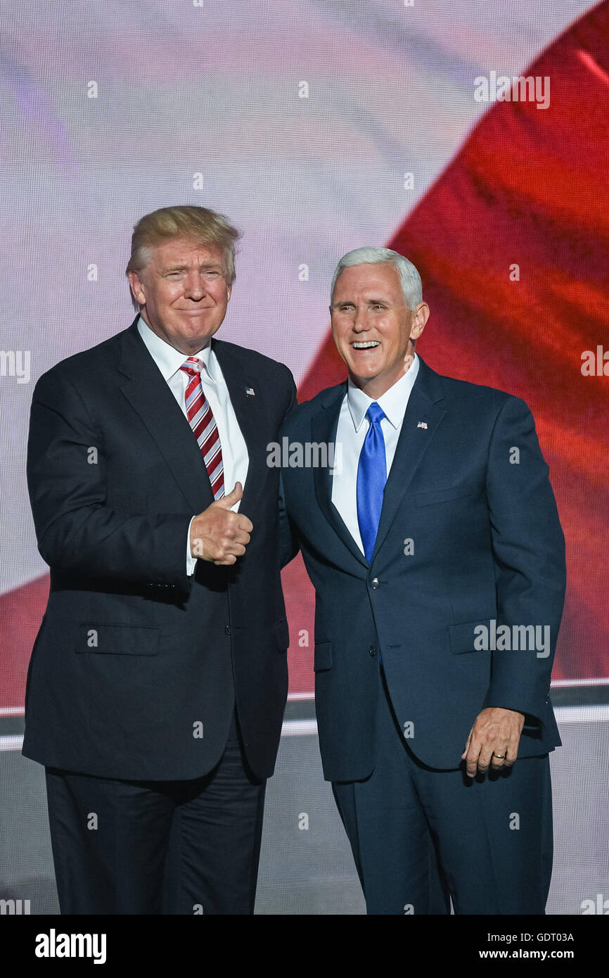 Cleveland, United States. 20th July, 2016. GOP Presidential nominee Donald Trump congratulates his running mate Gov. Mike Pence after Pence formally accepted the nomination during the third day of the Republican National Convention July 20, 2016 in Cleveland, Ohio. Credit:  Planetpix/Alamy Live News Stock Photo