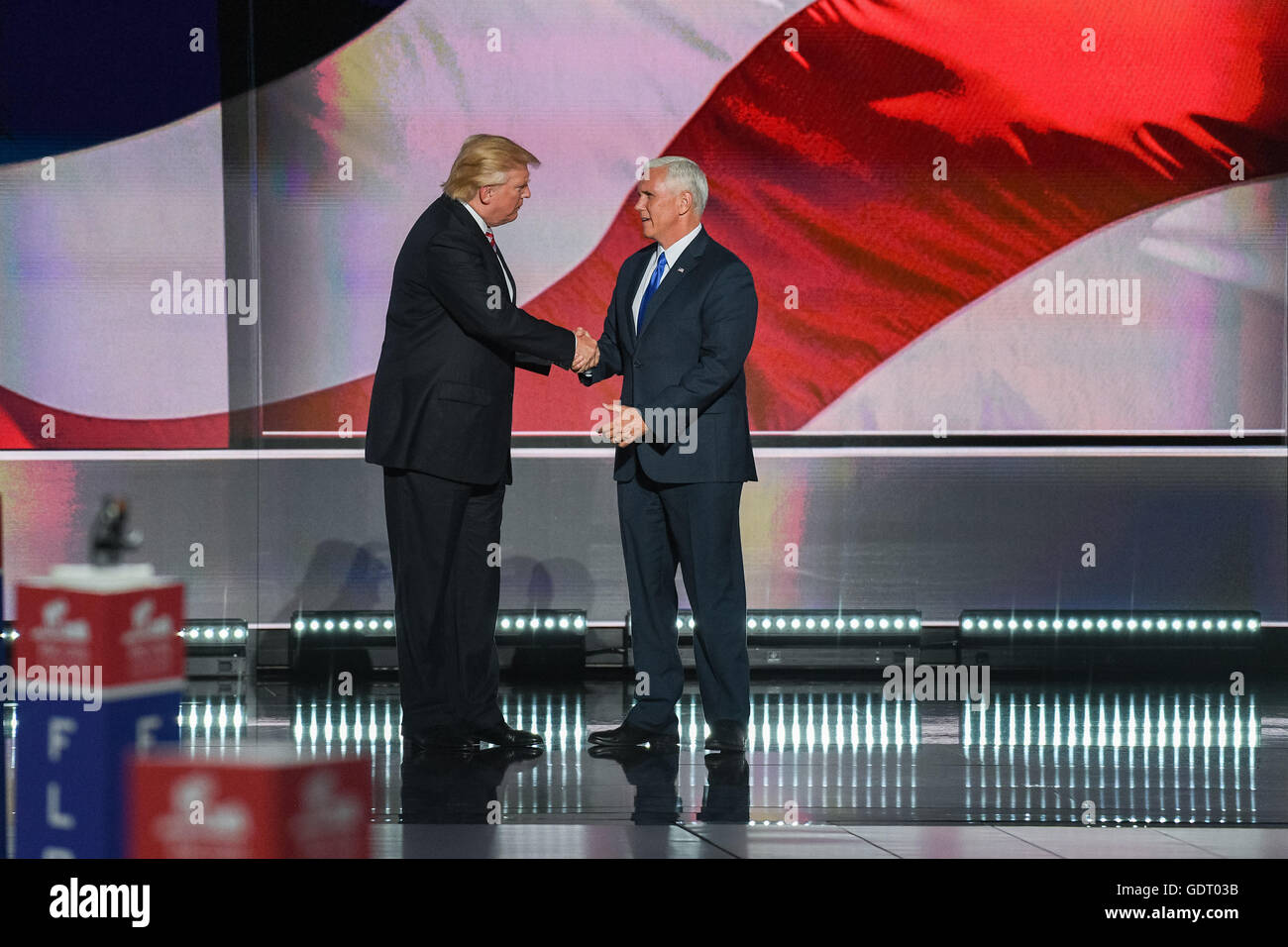 Cleveland, United States. 20th July, 2016. GOP Presidential nominee Donald Trump congratulates his running mate Gov. Mike Pence after Pence formally accepted the nomination during the third day of the Republican National Convention July 20, 2016 in Cleveland, Ohio. Credit:  Planetpix/Alamy Live News Stock Photo