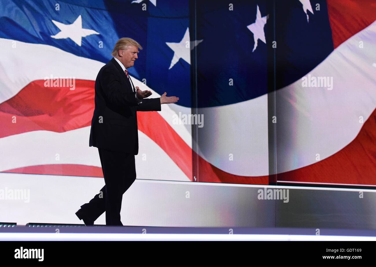 Cleveland, USA. 20th July, 2016. Republican presidential nominee Donald Trump takes the stage on the third day of the Republican National Convention in Cleveland, Ohio, the United States, July 20, 2016. Credit:  Yin Bogu/Xinhua/Alamy Live News Stock Photo