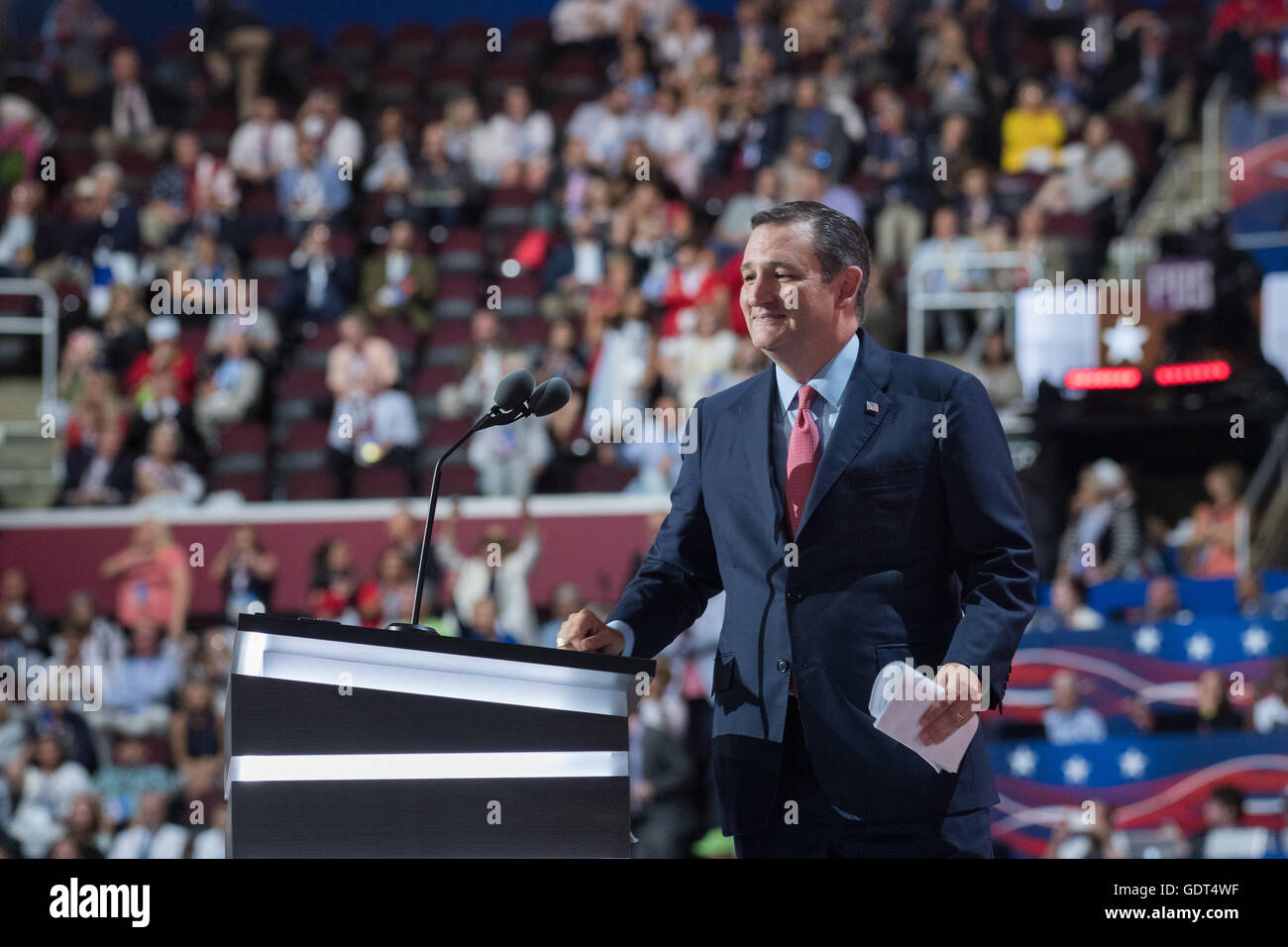 Senator Ted Cruz steps back from the podium after being cut off by officials during his addresses during the third day of the Republican National Convention July 20, 2016 in Cleveland, Ohio. Cruz spoke without endorsing Republican Presidential candidate Donald Trump and told delegates to vote with their conscience. Stock Photo