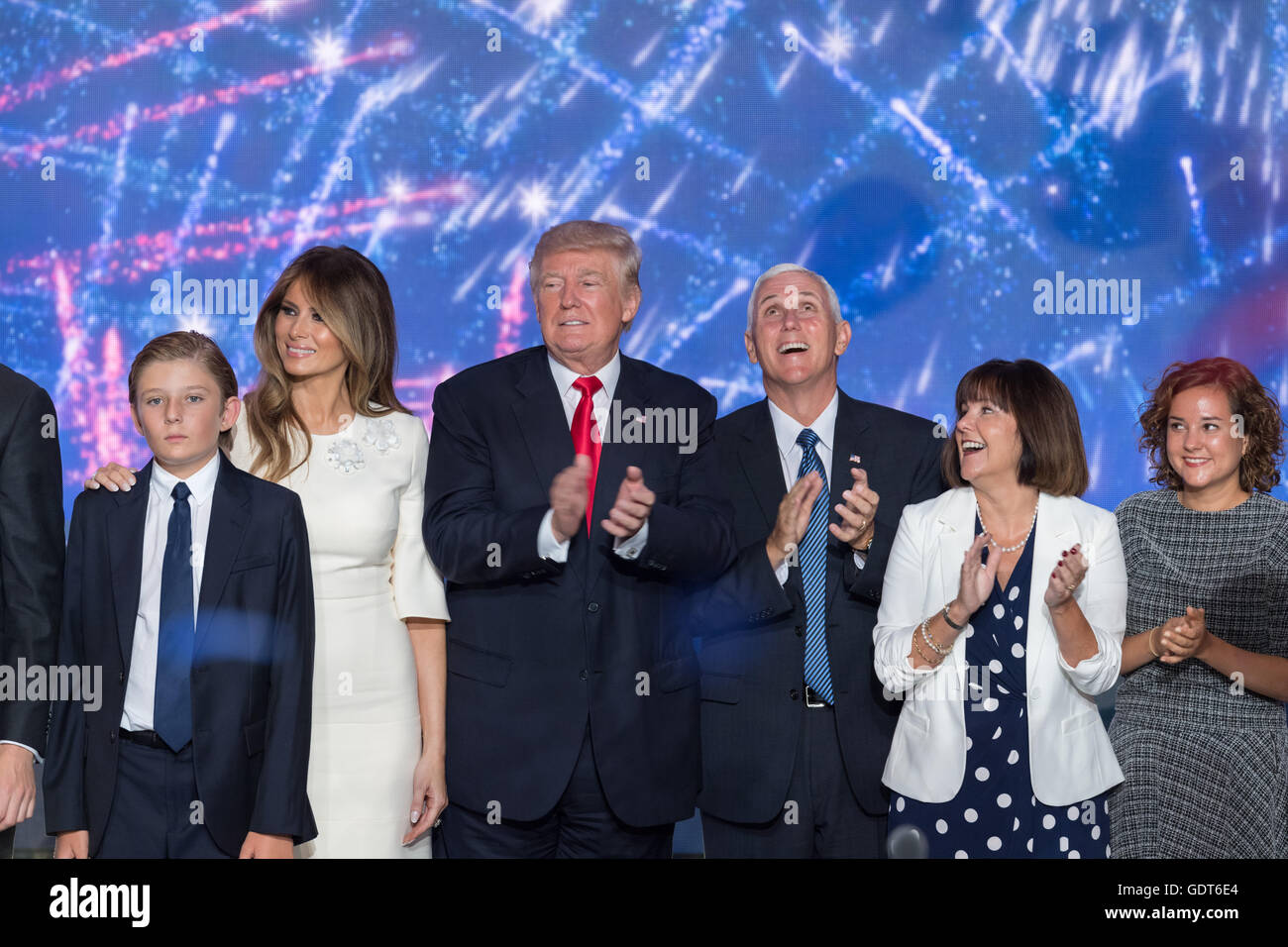 Cleveland, Ohio, USA. 21st July, 2016. GOP Presidential candidate Donald Trump stands with running mate Gov. Mike Pence and family members as balloons an confetti drop after accepting the party nomination for president on the final day of the Republican National Convention July 21, 2016 in Cleveland, Ohio. Credit:  Planetpix/Alamy Live News Stock Photo