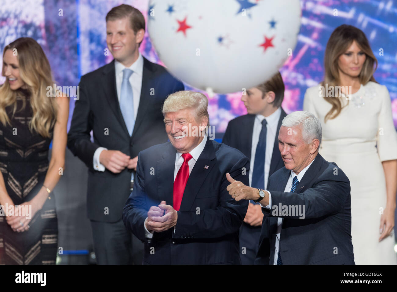 Cleveland, Ohio, USA. 21st July, 2016. GOP Presidential candidate Donald Trump and running mate Gov. Mike Pence and their families stand on stage as balloons and confetti drop after accepting the party nomination for president on the final day of the Republican National Convention July 21, 2016 in Cleveland, Ohio. Credit:  Planetpix/Alamy Live News Stock Photo