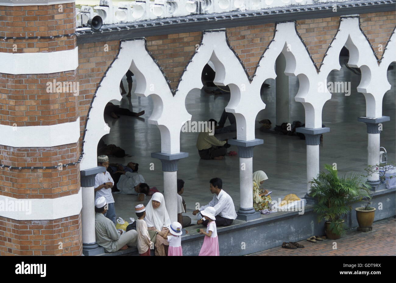 Muslim prayers at a Mosque in the city of  Kuala Lumpur in Malaysia in southeastasia. Stock Photo