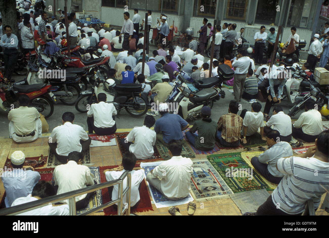 Muslim prayers at a Mosque in the city of  Kuala Lumpur in Malaysia in southeastasia. Stock Photo
