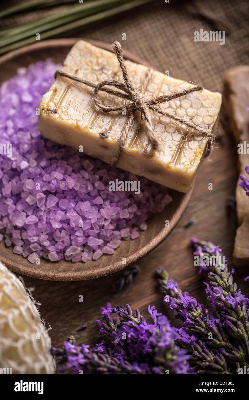Bar of natural soap and lavender bath salt Stock Photo