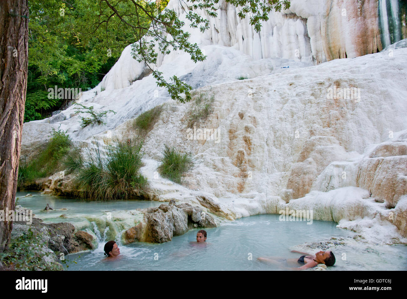 Fosso Bianco near San Filippo, white calcified waterfall in the woods with turquoise thermal water Stock Photo