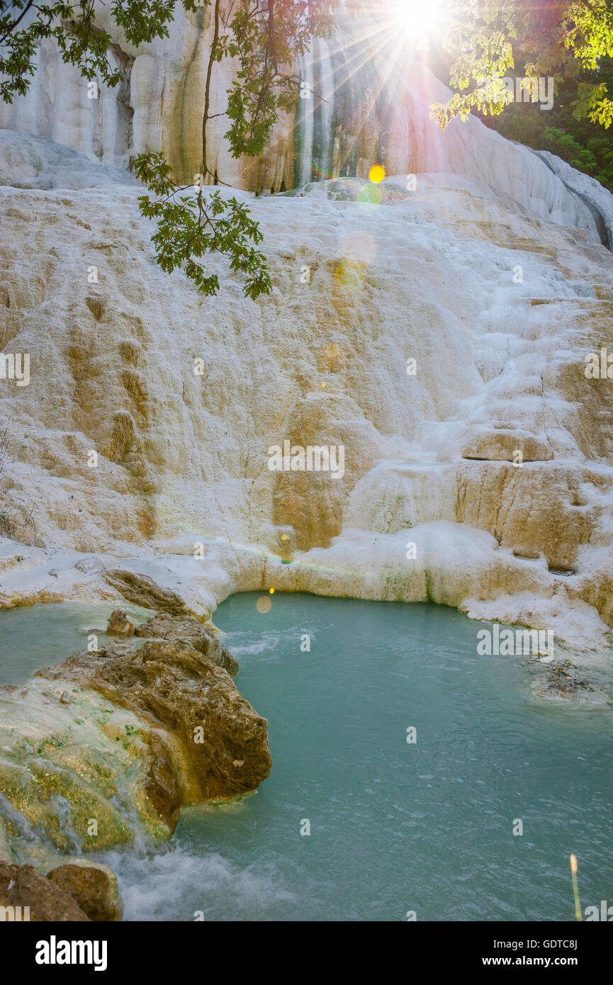Fosso Bianco near San Filippo, white calcified waterfall in the woods with turquoise thermal water Stock Photo