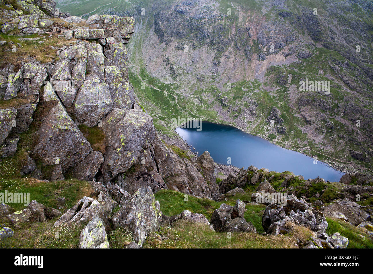 Goats Water lake from Dow Crag summit, a vertiginous drop from a wainwright in the Southern Fells of the English Lake District Stock Photo
