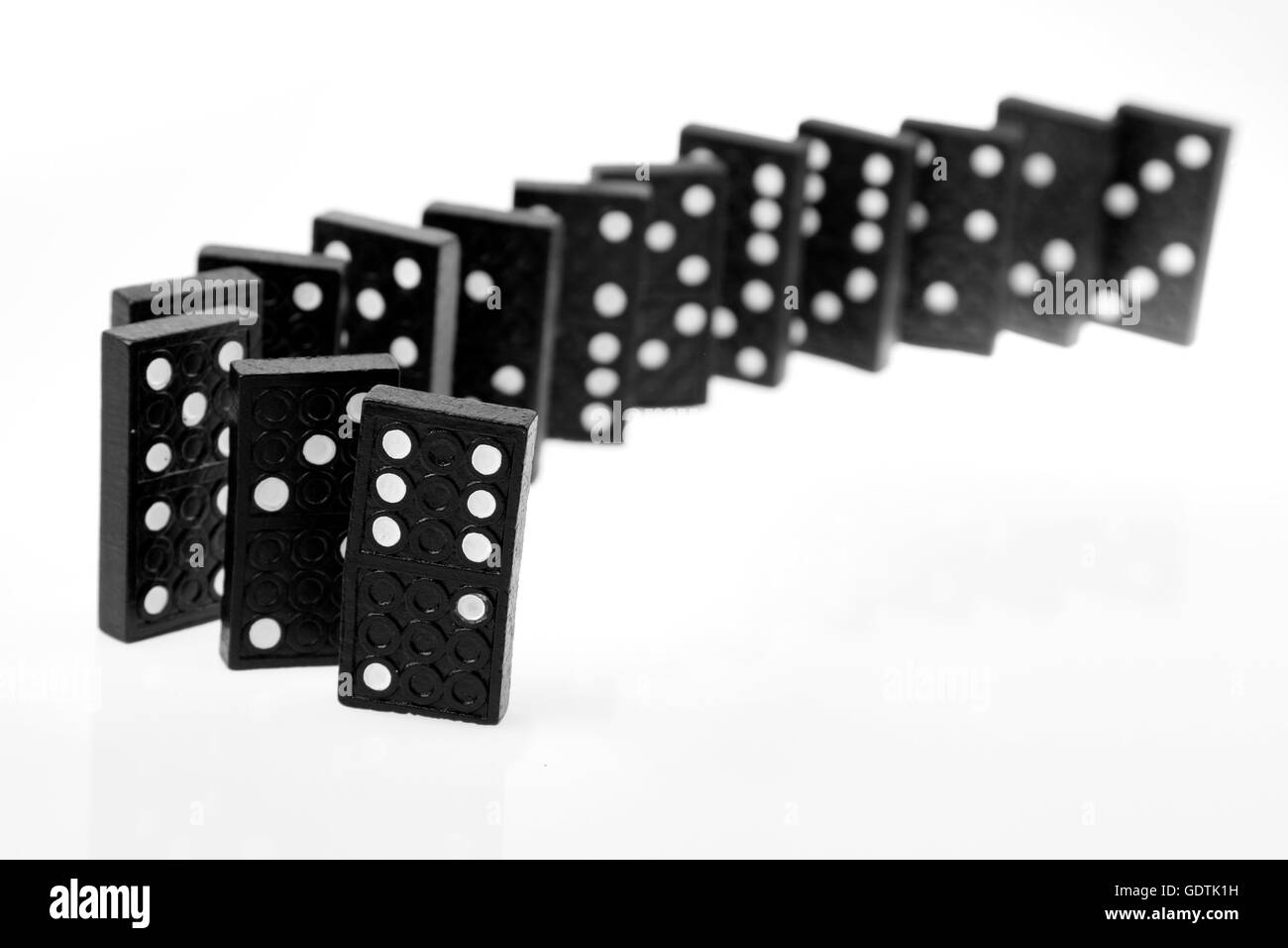 Black Dominoes game block on a colored background Stock Photo - Alamy