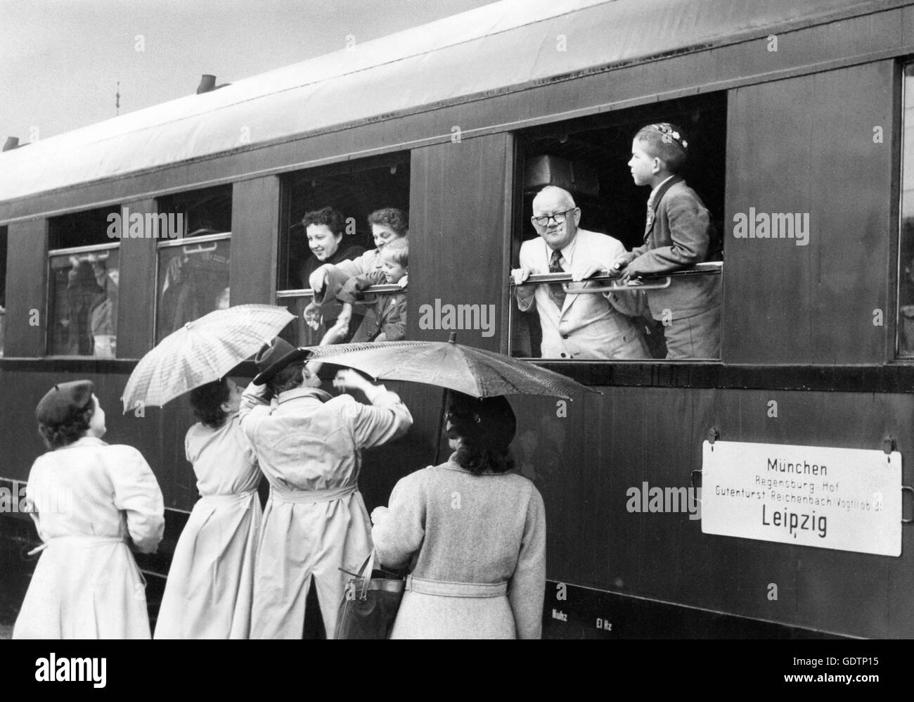 Passengers in an interzonal train, Munich-Leipzic Stock Photo