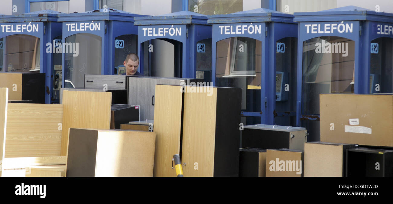 Bulky waste in front of phone booths in Bratislava Stock Photo