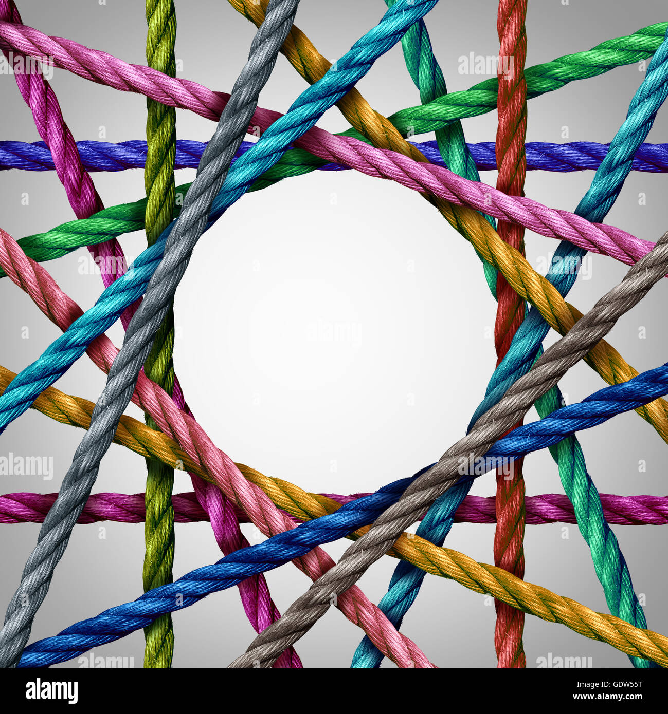 Connected divesisty and circle shaped group of ropes creating a centralized circular shape as a connect concept for business or Stock Photo
