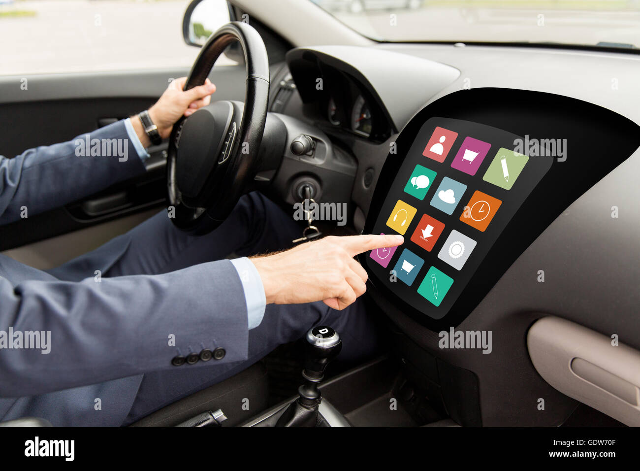 man driving car with menu icons on board computer Stock Photo - Alamy