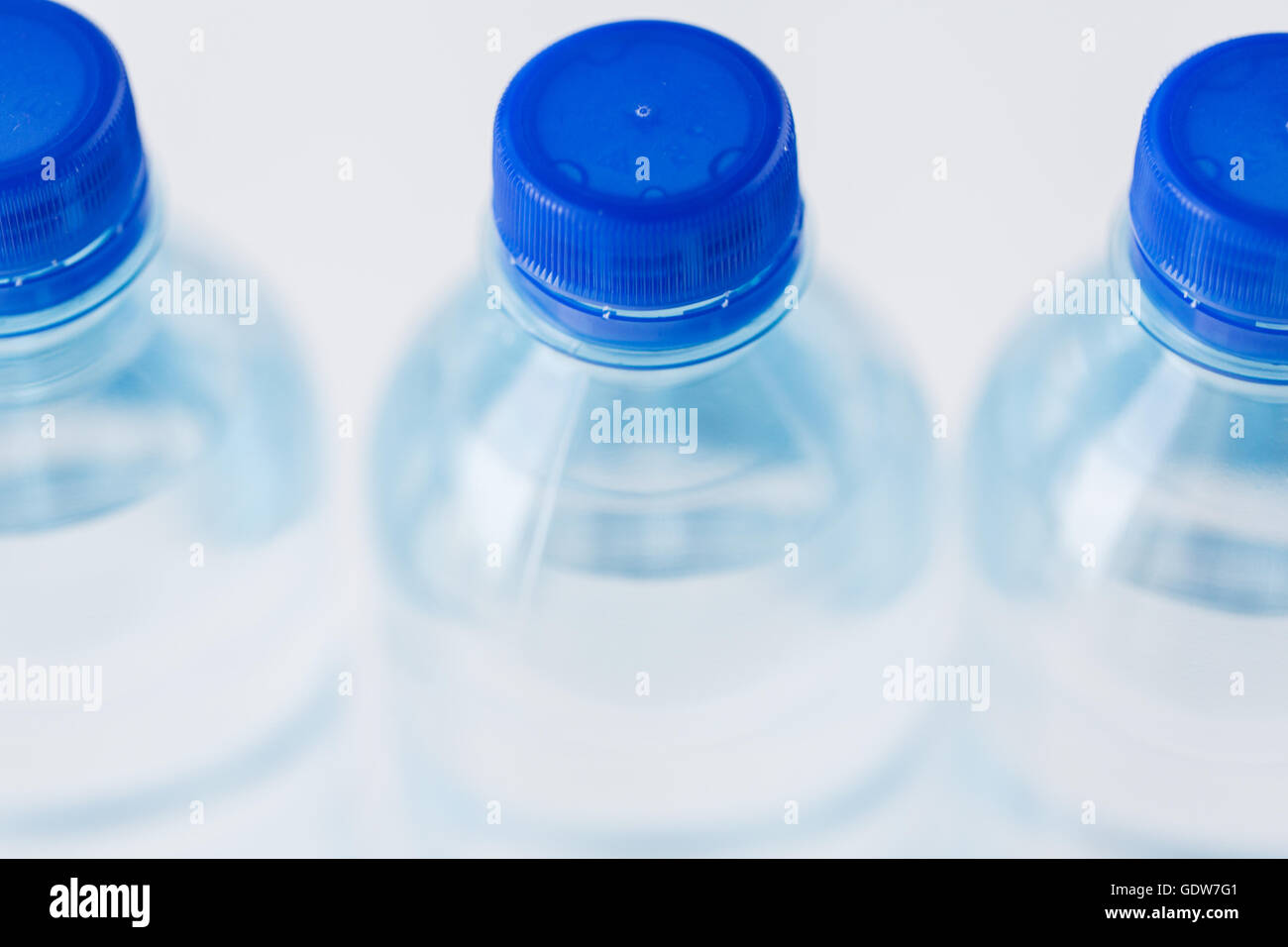 close up of plastic bottles with drinking water Stock Photo - Alamy