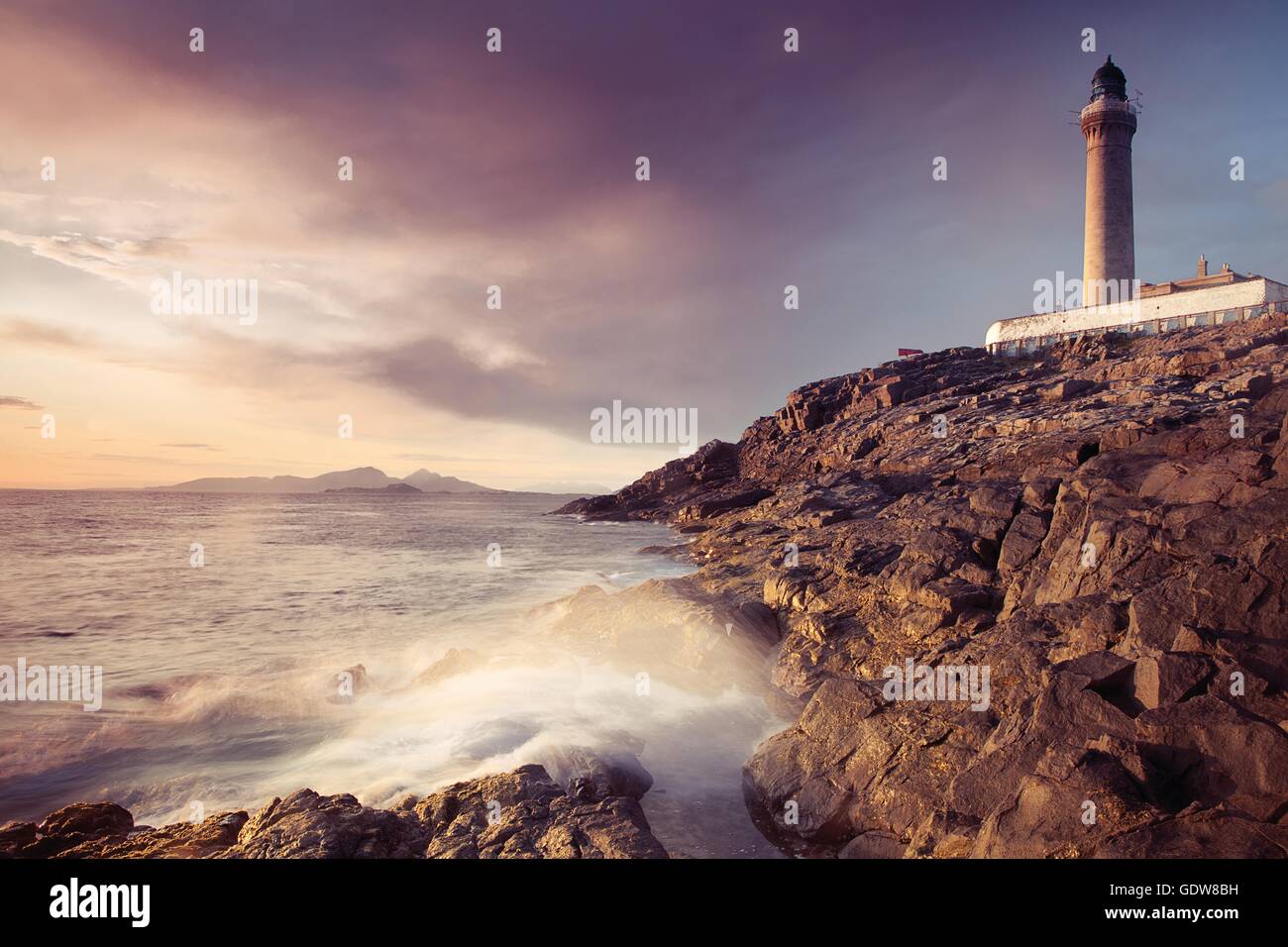 Lighthouse in sunset, sea, ardnamurchan Stock Photo