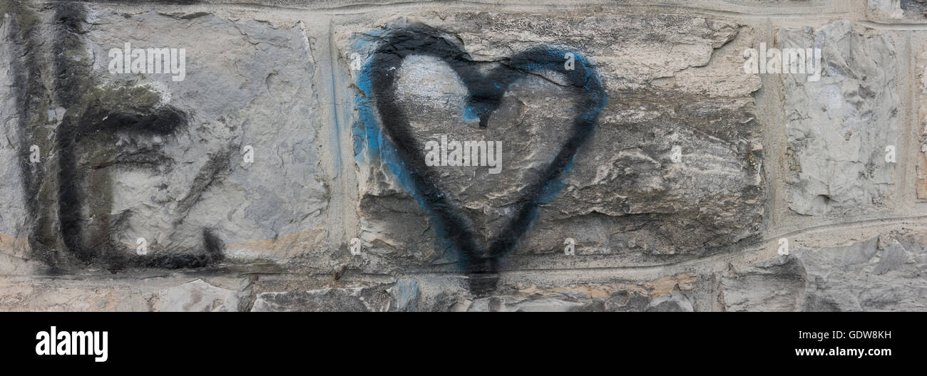New Graffiti Sprayed On A Stone Brick Wall With The A Letter E Stock Photo Alamy