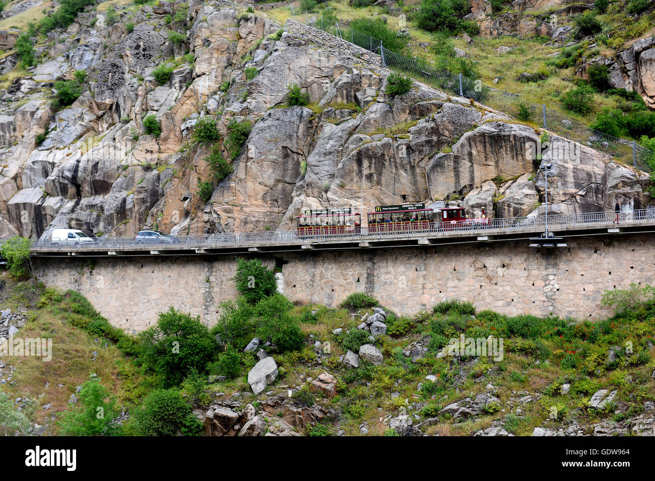 Road built construction on the side of rock cliff face Toledo Spain