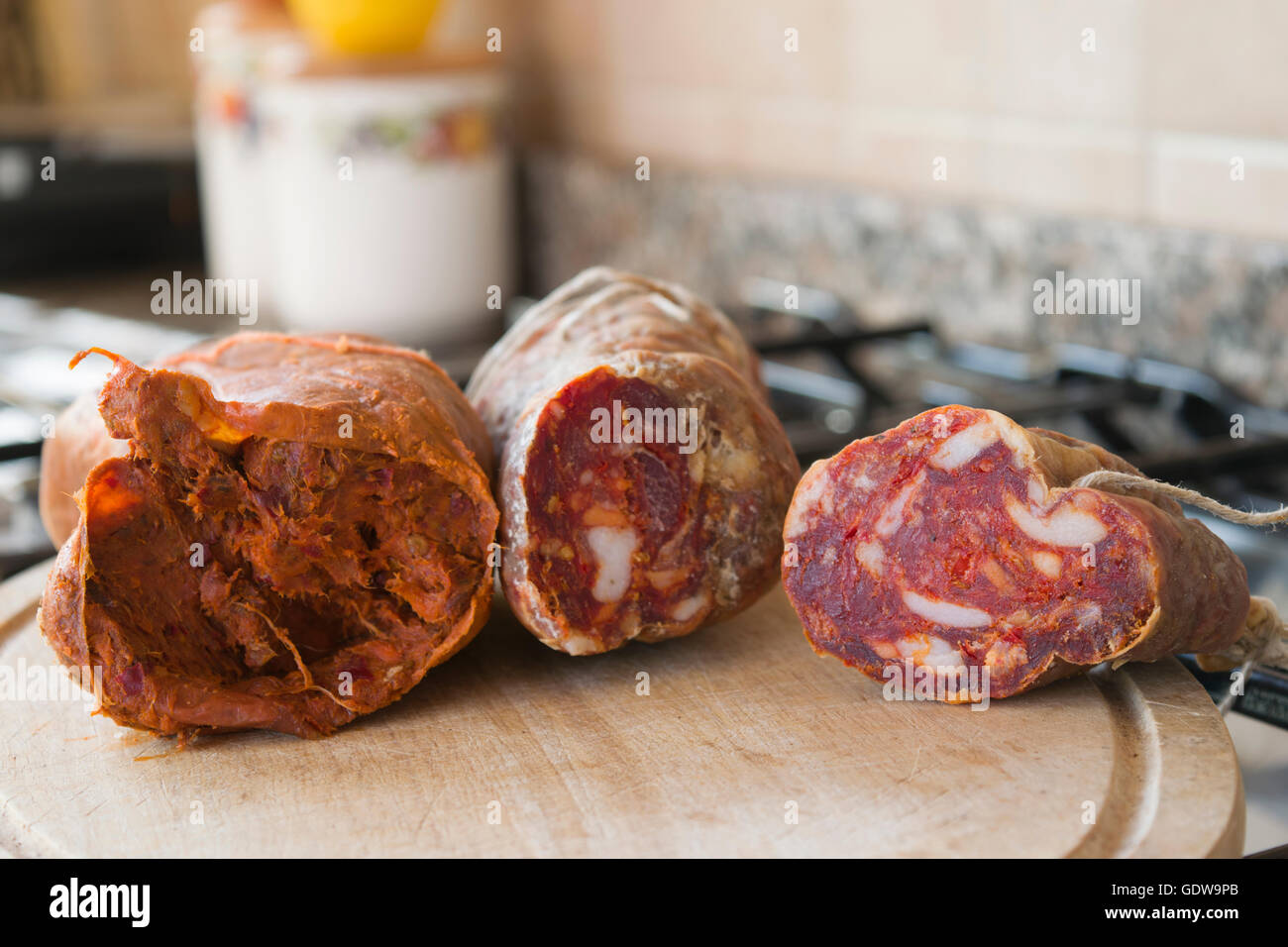 assortment of hot calabrian sausages spicy soppressata and nduja Stock