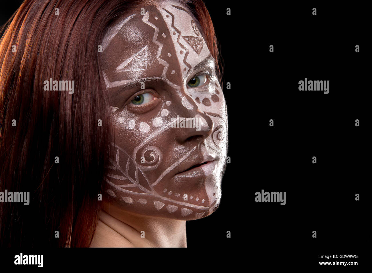 Portrait with face of woman with wild paint on it Stock Photo - Alamy