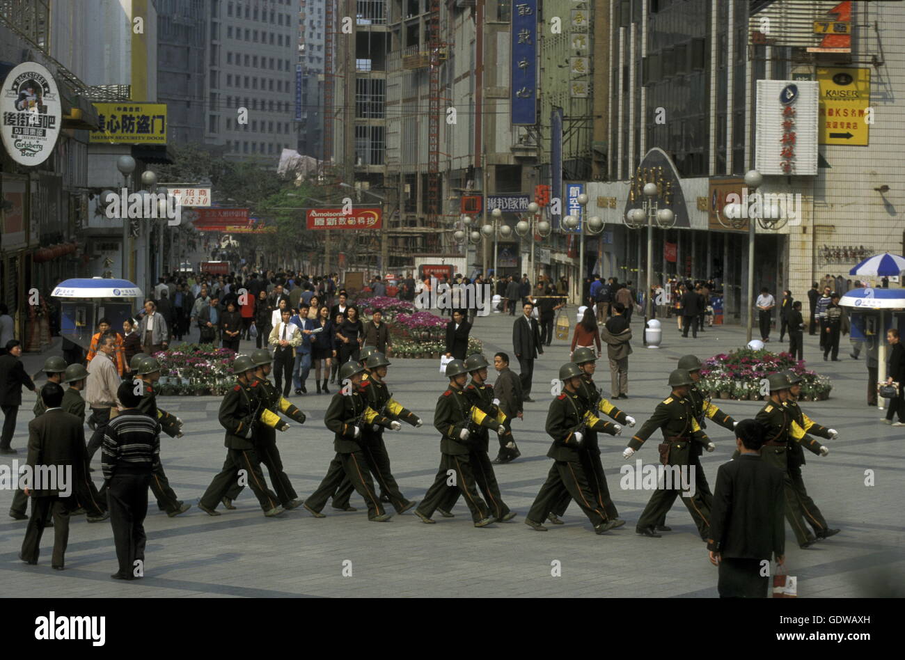 The army and people on the streets of Chongqing in the province of Sichuan in china in east asia. Stock Photo