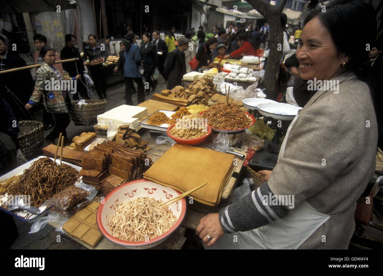 people on the Market streets of Chongqing in the province of Sichuan in china in east asia. Stock Photo