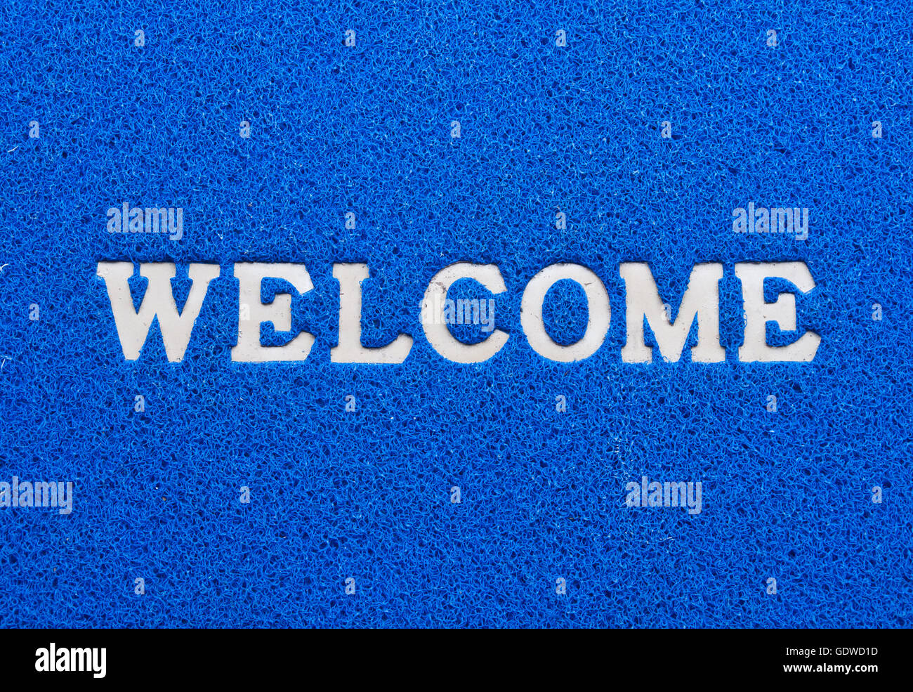 welcome text on  blue background Stock Photo