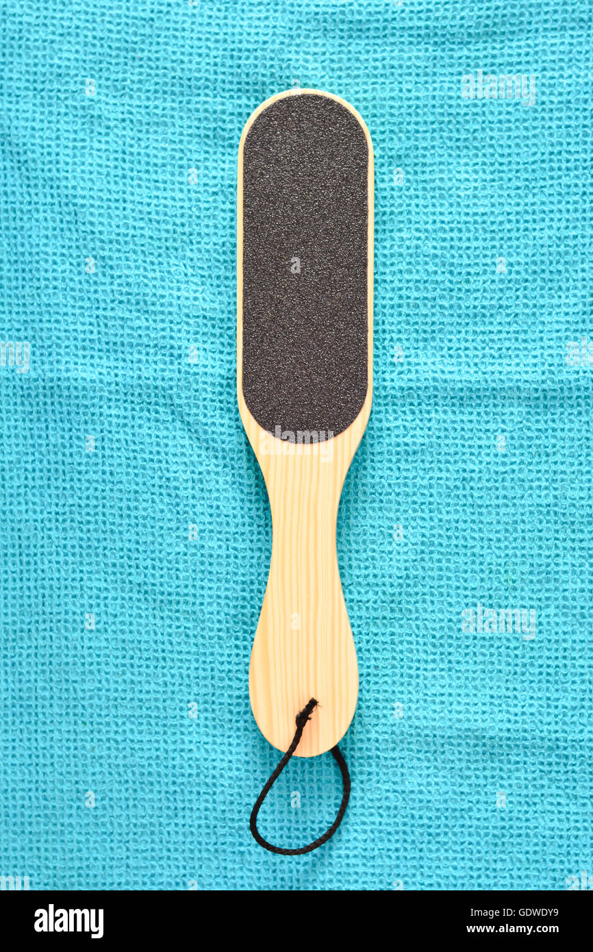 Foot file isolated on blue background Stock Photo