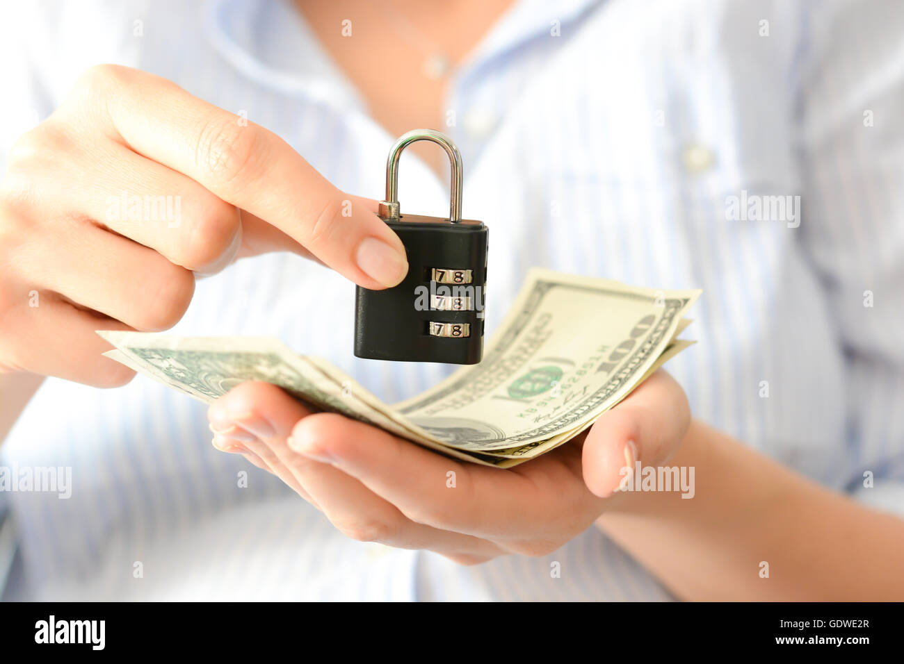 Secure your savings concept with cipher lock and money Stock Photo