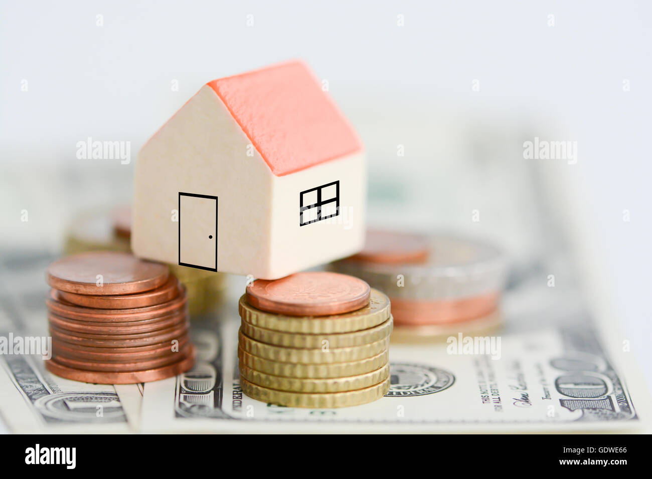 House property prices concept with money pillars from coins Stock Photo