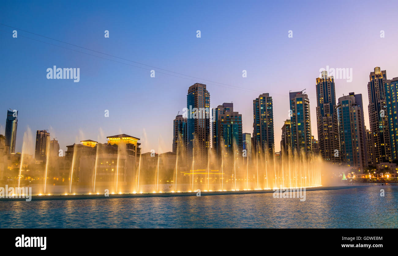 Choreographed Dubai Fountain in the evening - UAE Stock Photo