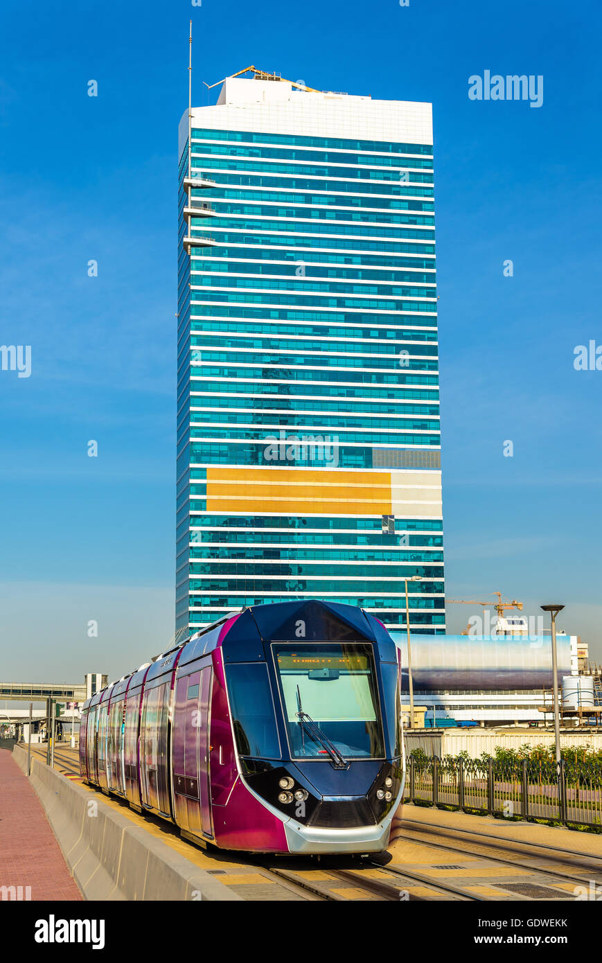 Groundlevel power supply tram in Jumeirah, Dubai Stock Photo Alamy