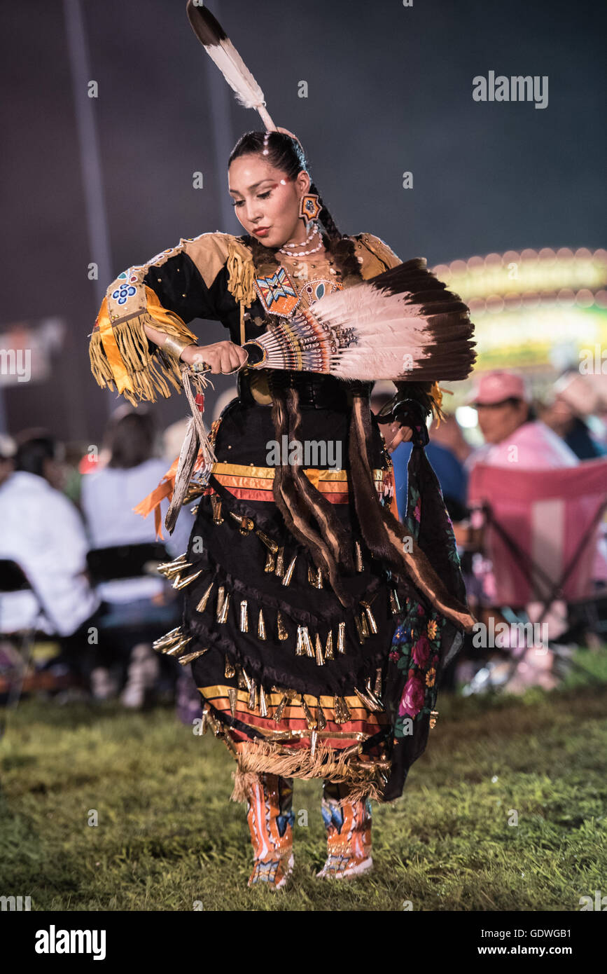 Native American woman performing jingle dress dance during Sac & Fox nation  Pow-wow, Stroud, Oklahoma, U.S.A Stock Photo - Alamy