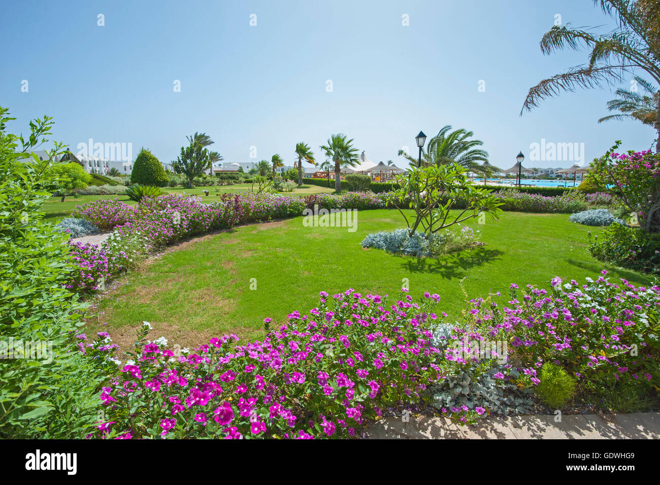 Formal landscaped gardens in grounds of a luxury tropical hotel resort Stock Photo